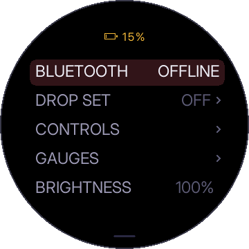 Settings: BLUETOOTH OFFLINE, DROP SET OFF, CONTROLS, GAUGES, BRIGHTNESS 100%, with a battery icon at 15% on top
